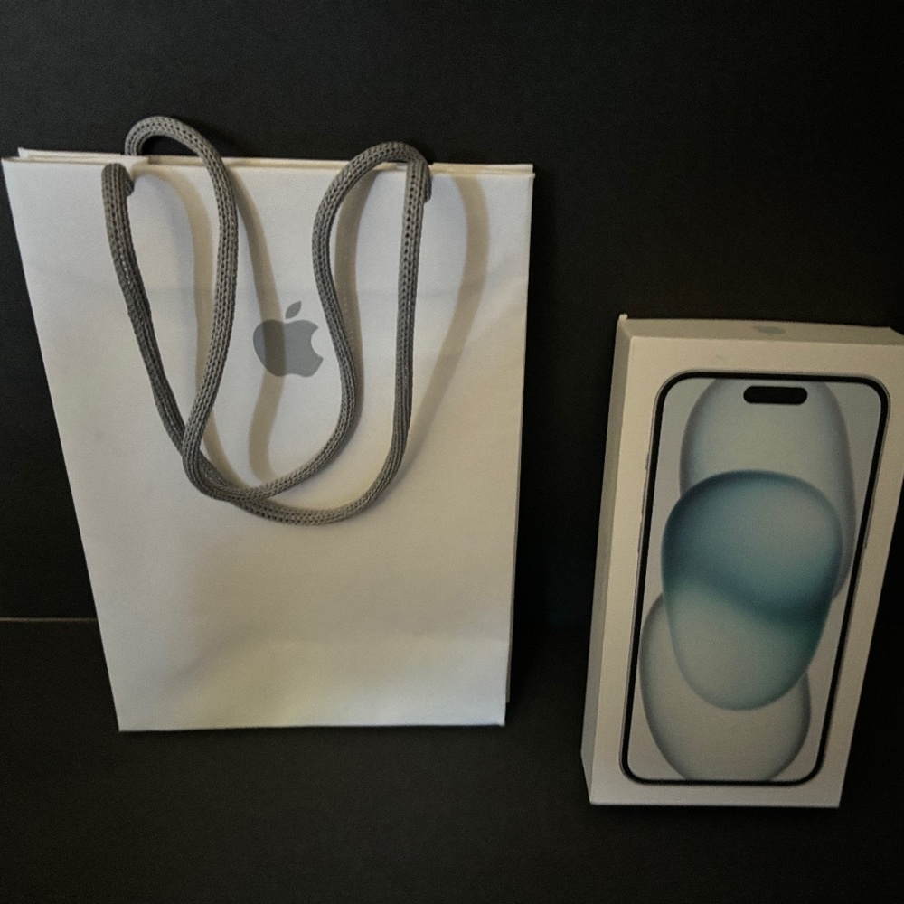 iPhone 15 Plus Box (no phone) and Apple bag